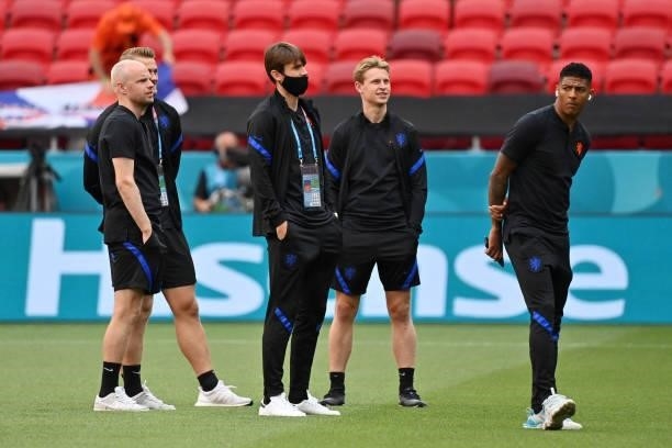 Davy Klaassen, Frenkie de Jong and Patrick van Aanholt of Netherlands inspect the pitch prior to the UEFA Euro 2020 Championship Round of 16 match...