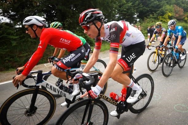 Silvan Dillier of Switzerland and Team Alpecin-Fenix & Vegard Stake Laengen of Norway and UAE-Team Emirates during the 108th Tour de France 2021,...