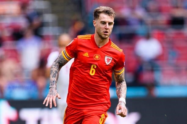 Joe Rodon of Wales runs in the field during the UEFA Euro 2020 Championship Round of 16 match between Wales and Denmark at Johan Cruijff Arena on...