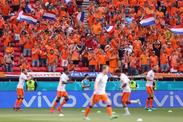 Fans of Netherlands show their support as players of Netherlands warm up prior to the UEFA Euro 2020 Championship Round of 16 match between...