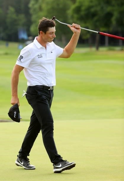 Viktor Hovland of Norway celebrates after his birdie putt on the 18th green during the final round of The BMW International Open at Golfclub Munchen...