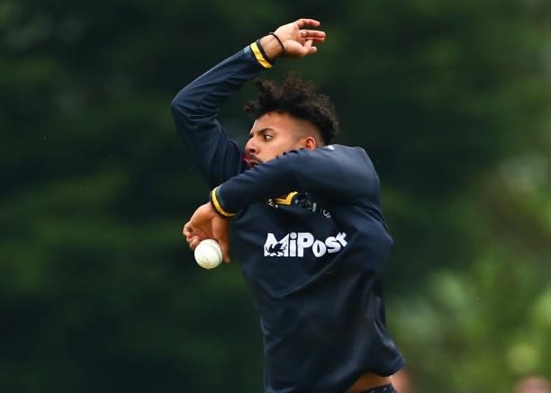 Prem Sisodiya of Glamorgan bowls during the Vitality Blast T20 match between Middlesex and Glamorgan at Radlett Cricket Club on June 27, 2021 in...