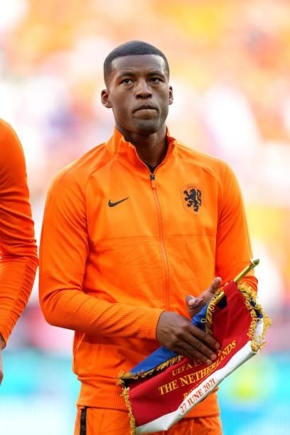 Georginio Wijnaldum of Netherlands stands with the team pennant prior to the UEFA Euro 2020 Championship Round of 16 match between Netherlands and...