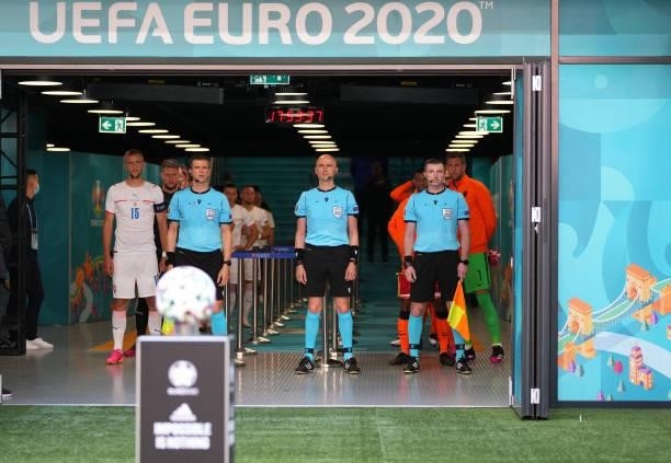 Match Referee, Sergei Karasev prepares to lead both side's out prior to the UEFA Euro 2020 Championship Round of 16 match between Netherlands and...