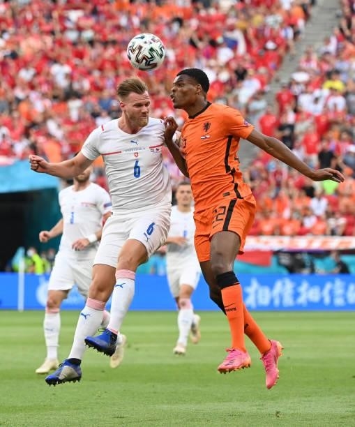 Denzel Dumfries of Netherlands competes for a header with Tomas Kalas of Czech Republic during the UEFA Euro 2020 Championship Round of 16 match...