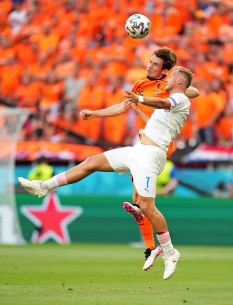 Marten de Roon of Netherlands competes for a header with Antonin Barak of Czech Republic during the UEFA Euro 2020 Championship Round of 16 match...