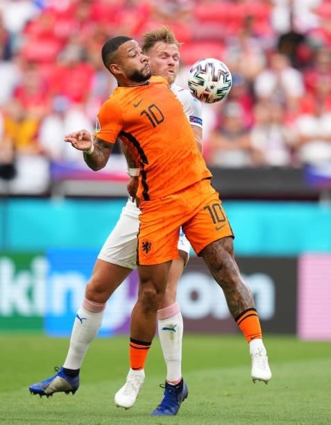 Memphis Depay of Netherlands battles for possession with Tomas Kalas of Czech Republic during the UEFA Euro 2020 Championship Round of 16 match...