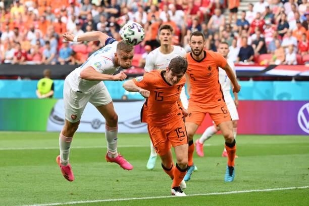 Tomas Soucek of Czech Republic competes for a header with Marten de Roon of Netherlands during the UEFA Euro 2020 Championship Round of 16 match...