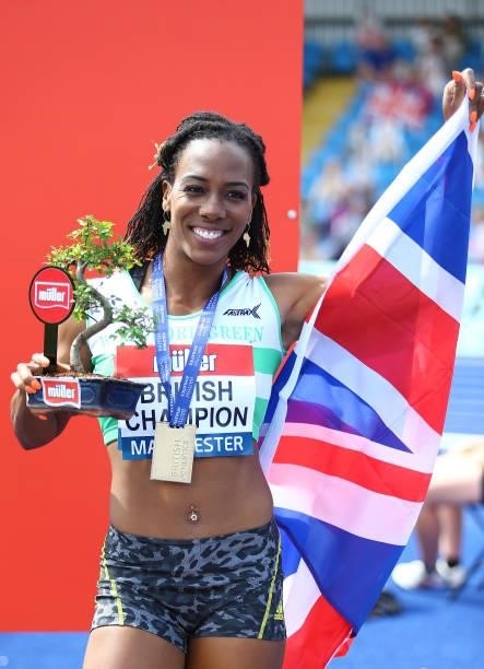 Tiffany Porter of Woodford Green poses for photographs after winning the Womens 100m Hurdles Final on Day Three of the Muller British Athletics...