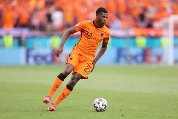 Denzel Dumfries of Netherlands runs with the ball during the UEFA Euro 2020 Championship Round of 16 match between Netherlands and Czech Republic at...