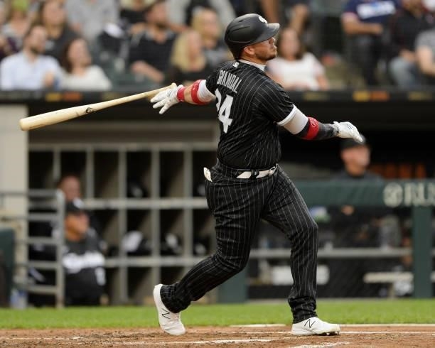 Yasmani Grandal of the Chicago White Sox hits a solo home run against the Seattle Mariners on June 25, 2021 at Guaranteed Rate Field in Chicago,...