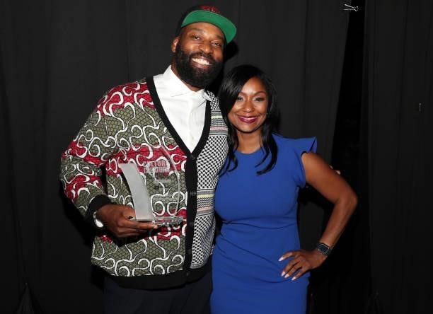 Baron Davis poses for a photograph backstage with Joi Brown, Founder of Culture Creators after receiving his award at the Culture Creators Innovators...