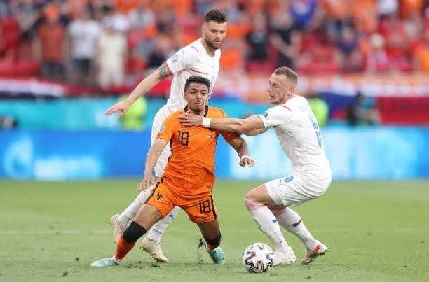 Donyell Malen of Netherlands is challenged by Vladimir Coufal of Czech Republic during the UEFA Euro 2020 Championship Round of 16 match between...