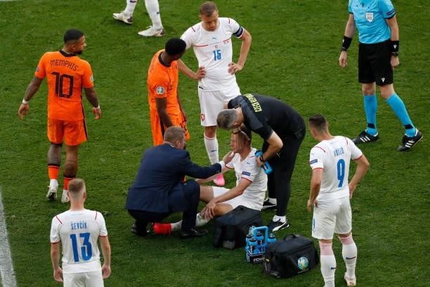 Pavel Kaderabek of Czech Republic receives medical treatment during the UEFA Euro 2020 Championship Round of 16 match between Netherlands and Czech...