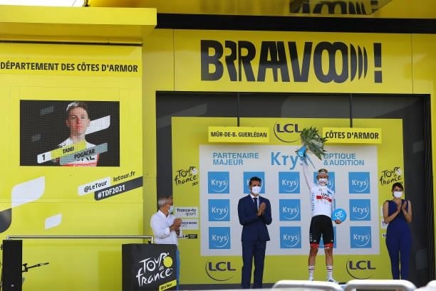 Tadej Pogačar of Slovenia and UAE-Team Emirates white best young jersey celebrates at podium during the 108th Tour de France 2021, Stage 2 a 183,5km...