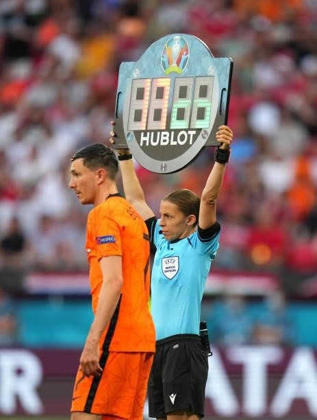 Fourth Official, Stephanie Frappart raises the substitute board as Steven Berghuis of Netherlands waits to enter the pitch during the UEFA Euro 2020...