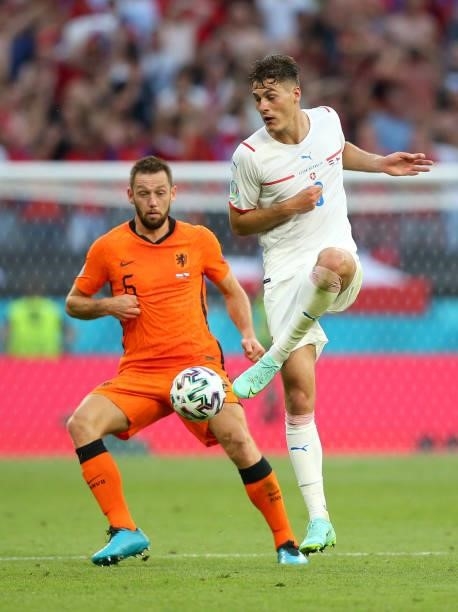 Patrik Schick of Czech Republic controls the ball whilst under pressure from Stefan de Vrij of Netherlands during the UEFA Euro 2020 Championship...