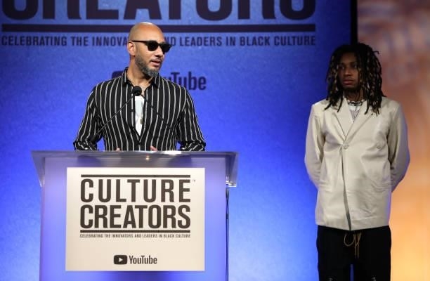 Swizz Beatz, recipient of the 2021 Culture Creatos Icon award speaks onstage as his son Nasir looks on at the Culture Creators Innovators & Leaders...