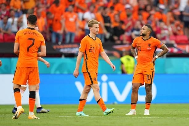 Frenkie de Jong and Memphis Depay of Netherlands look dejected after the UEFA Euro 2020 Championship Round of 16 match between Netherlands and Czech...