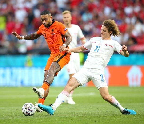 Memphis Depay of Netherlands is challenged by Alex Kral of Czech Republic during the UEFA Euro 2020 Championship Round of 16 match between...