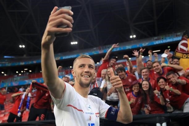 Tomas Soucek of Czech Republic takes a selfie with the fans following victory in the UEFA Euro 2020 Championship Round of 16 match between...