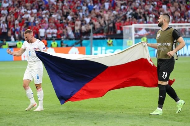 Vladimir Coufal and Jiri Pavlenka of Czech Republic celebrate their side's victory with a flag of Czech Republic after the UEFA Euro 2020...