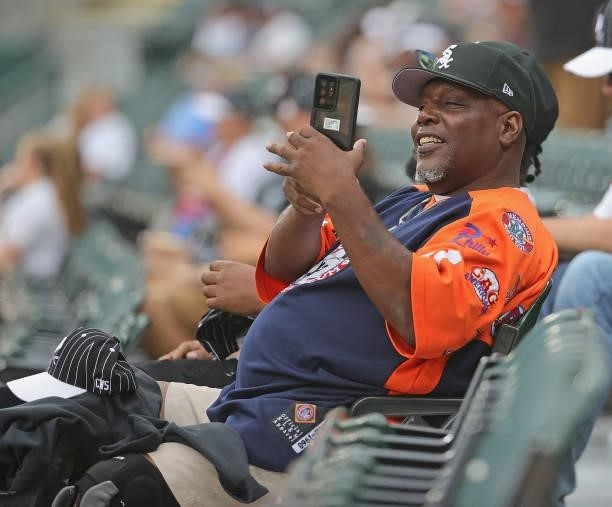 Fan takes a photo before the Chicago White Sox take on the Seattle Mariners at Guaranteed Rate Field on June 25, 2021 in Chicago, Illinois. The...