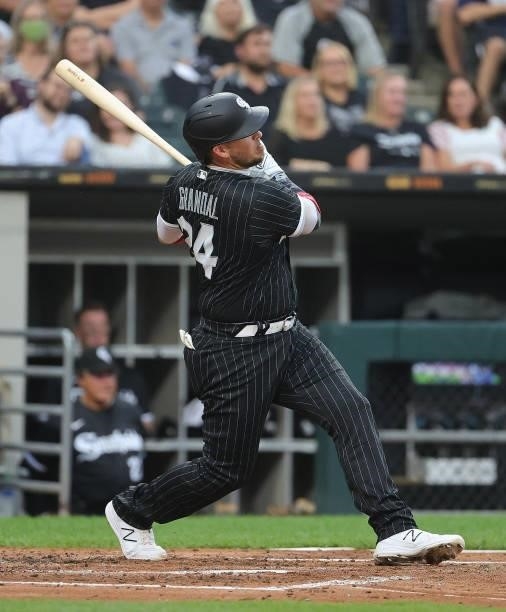 Yasmani Grandal of the Chicago White Sox hits a solo home run against the Seattle Mariners at Guaranteed Rate Field on June 25, 2021 in Chicago,...