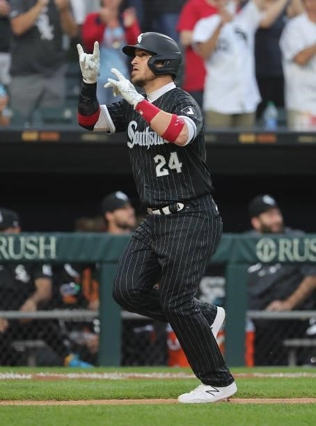 Yasmani Grandal of the Chicago White Sox celebrates his solo home run against the Seattle Mariners at Guaranteed Rate Field on June 25, 2021 in...