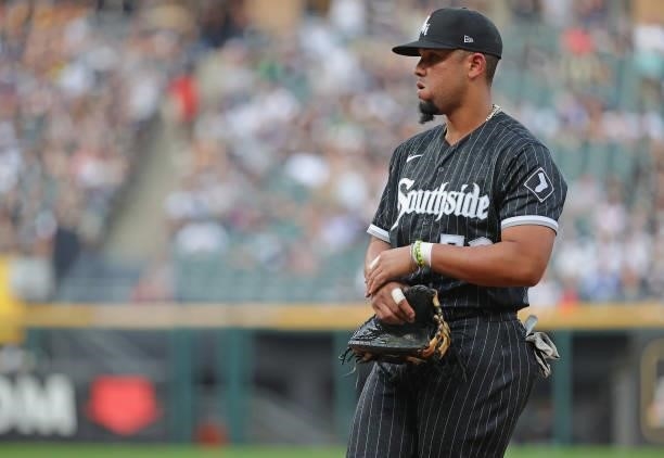 Jose Abreu of the Chicago White Sox waits to man his position against the Seattle Mariners at Guaranteed Rate Field on June 25, 2021 in Chicago,...