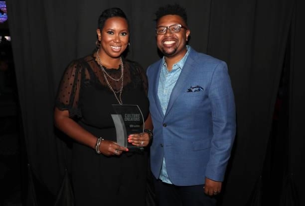 Stefanie Brown James and Quentin James pose backstage after he presented her with the 2021 Culture Creators Social Justice award at the Culture...