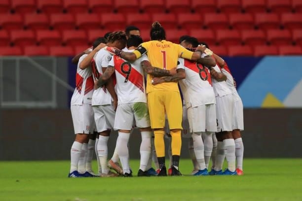Players of Peru huddle before a Group B Match between Venezuela and Peru as part of Copa America Brazil 2021 at Mane Garrincha Stadium on June 27,...