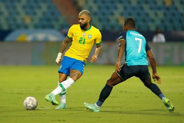 Gabriel Barbosa of Brazil competes for the ball with Pervis Estupiñan of Ecuador during a group B match between Brazil and Ecuador as part of Copa...