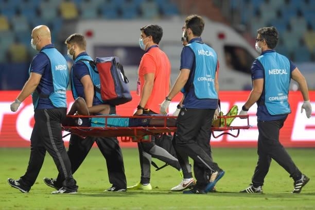 Moises Caicedo of Ecuador leaves the pitch in a stretcher after being injured during a group B match between Brazil and Ecuador as part of Copa...