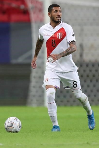 Sergio Peña of Peru drives the ball during a Group B Match between Venezuela and Peru as part of Copa America Brazil 2021 at Mane Garrincha Stadium...