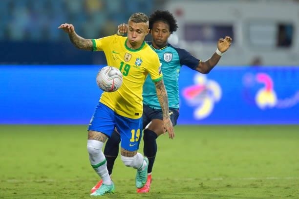 Everton of Brazil competes for the ball with Angelo Preciado of Ecuador during a group B match between Brazil and Ecuador as part of Copa America...