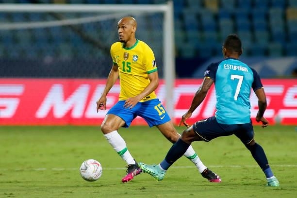 Fabinho of Brazil competes for the ball with Pervis Estupiñan of Ecuador during a group B match between Brazil and Ecuador as part of Copa America...