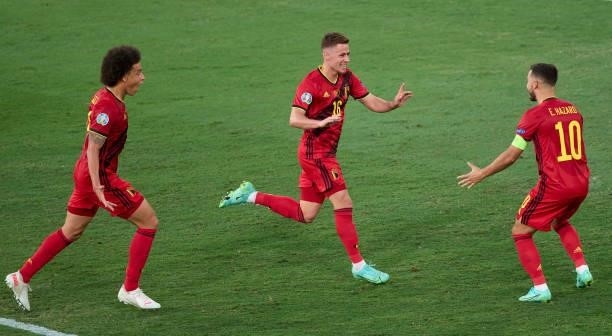 Thorgan Hazard of Belgium celebrates after scoring his team's first goal with his teammate Eden Hazard during the UEFA Euro 2020 Championship Round...