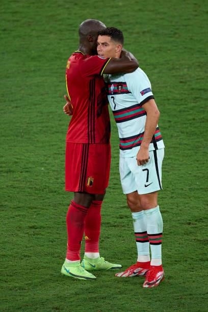 Romelu Lukaku of Belgium consoles Cristiano Ronaldo of Portugal following the UEFA Euro 2020 Championship Round of 16 match between Belgium and...
