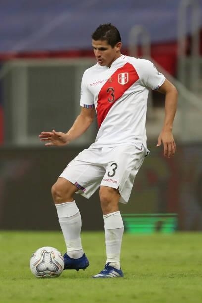 Aldo Corzo of Peru plays the ball during a Group B Match between Venezuela and Peru as part of Copa America Brazil 2021 at Mane Garrincha Stadium on...