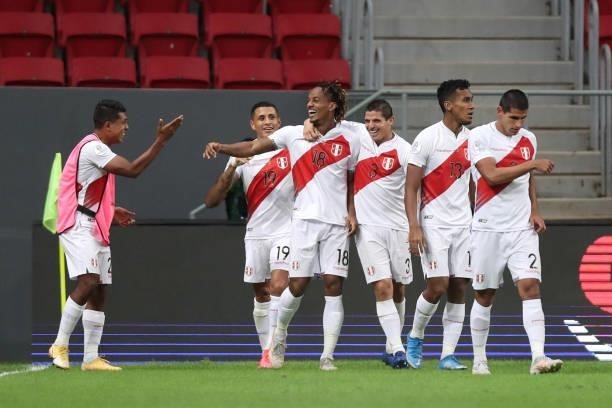 André Carrillo of Peru celebrates with teammates after scoring the opening goal during a Group B Match between Venezuela and Peru as part of Copa...