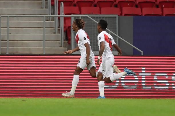 André Carrillo of Peru celebrates after scoring the opening goal during a Group B Match between Venezuela and Peru as part of Copa America Brazil...