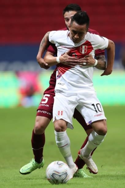 Christian Cueva of Peru and Junior Moreno of Venezuela fight for the ball during a Group B Match between Venezuela and Peru as part of Copa America...
