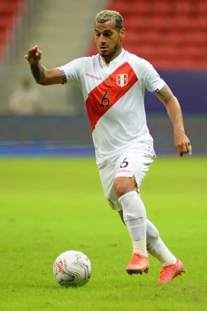 Miguel Trauco of Peru drives the ball during a Group B Match between Venezuela and Peru as part of Copa America Brazil 2021 at Mane Garrincha Stadium...