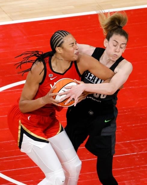 Breanna Stewart of the Seattle Storm fouls Liz Cambage of the Las Vegas Aces during their game at Michelob ULTRA Arena on June 27, 2021 in Las Vegas,...
