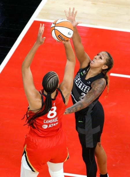 Liz Cambage of the Las Vegas Aces shoots against Mercedes Russell of the Seattle Storm during their game at Michelob ULTRA Arena on June 27, 2021 in...