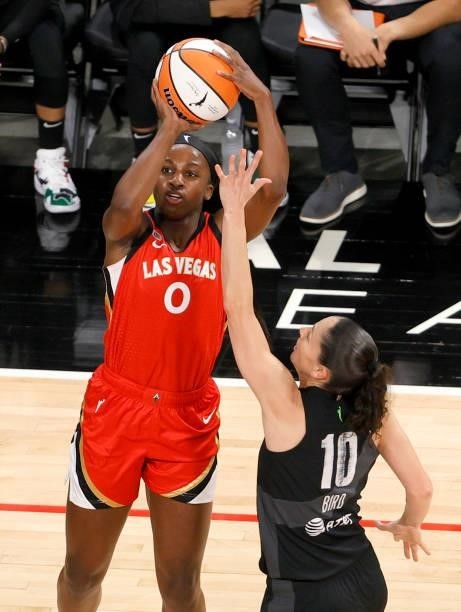 Jackie Young of the Las Vegas Aces shoots against Sue Bird of the Seattle Storm during their game at Michelob ULTRA Arena on June 27, 2021 in Las...