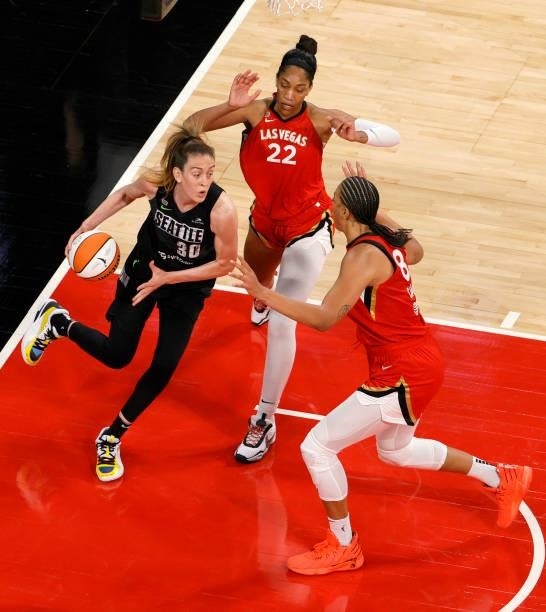 Breanna Stewart of the Seattle Storm is double teamed by A'ja Wilson and Liz Cambage of the Las Vegas Aces during their game at Michelob ULTRA Arena...