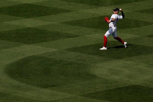 Enrique Hernandez of the Boston Red Sox warms up between the sixth and seventh inning against the New York Yankees at Fenway Park on June 27, 2021 in...