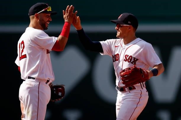 Hunter Renfroe of the Boston Red Sox and Marwin Gonzalez celebrate after the Red Sox defeat the New York Yankees 9-2 at Fenway Park on June 27, 2021...